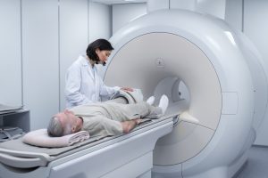 doctor-getting-patient-ready-ct-scan